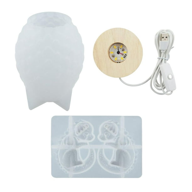 Modelo creativo de huevo de dragón de resina epoxi con base iluminada, luz nocturna en forma de huevo. Luz blanca