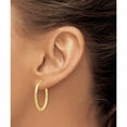 thumbnail image 3 of 10K Yellow Gold Jbsp's Polished D/C Oval Hoop Earrings (26 X 34.4) Made In Italy 10le261, 3 of 5