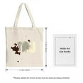 thumbnail image 3 of Stylish canvas tote bag with bold ' YOU ' in gray and white splatter design on a light beige background perfect for shopping and travel, 3 of 4