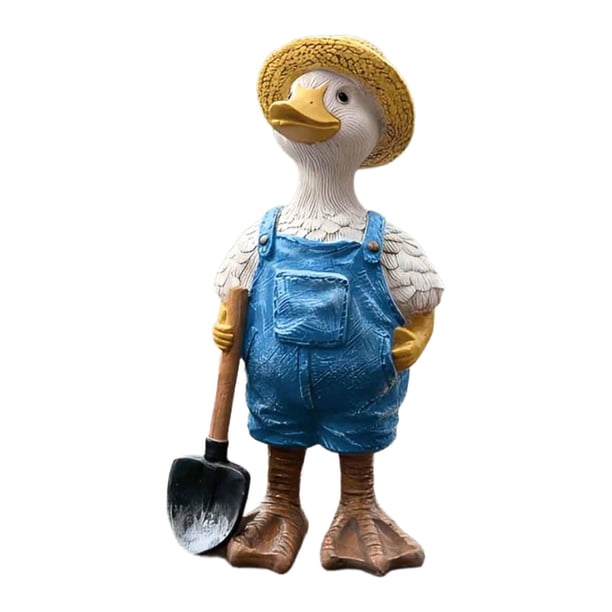 Estatua de un animal, escultura de animal, figura pintada a mano, miniatura para jardín. con pala