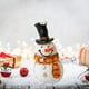 thumbnail image 1 of Decoración Festiva para La Mesa Navideña con Figuras de Muñecos de Nieve Que Añaden Alegría Navideña. Ideal para Centros de Mesa, Repisas y Arreglos Festivos., 1 of 6