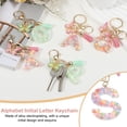 thumbnail image 4 of Llavero de letra inicial del alfabeto Uxcell, llaveros de resina lindos con borlas y encanto de colgante de mariposa para mujeres S, 4 of 7