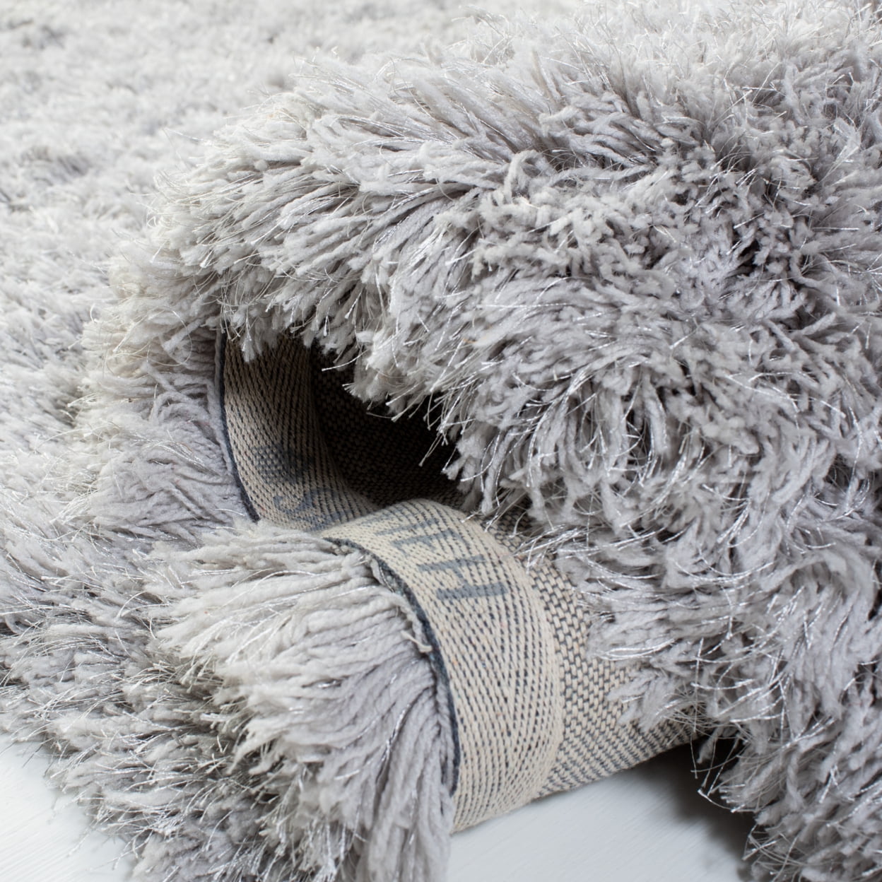 SAFAVIEH Ocean Braxton Solid Polyester Shag Area Rug, Silver, 3' x 5'