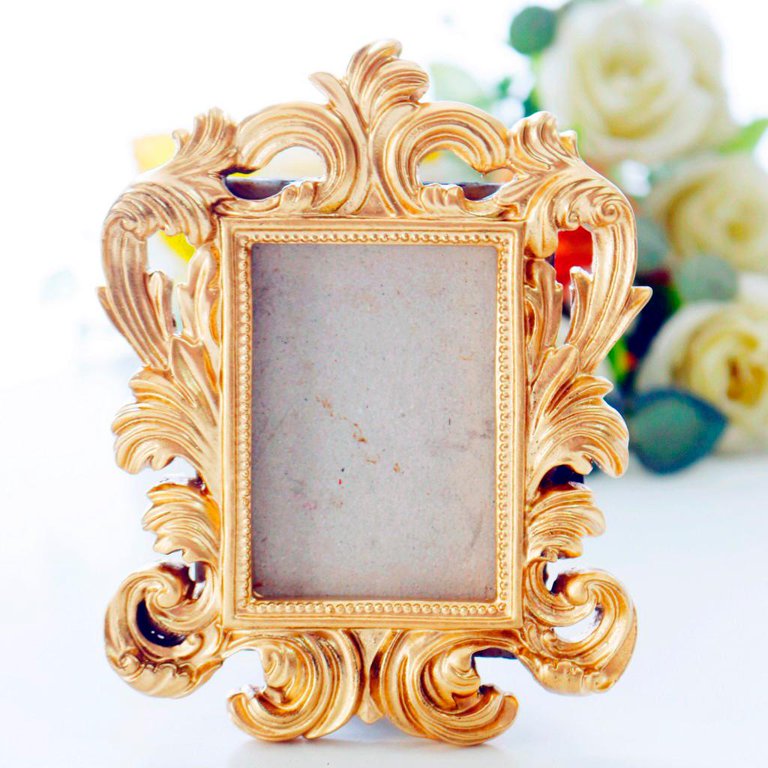 Photo Booth Frame: Made with large piece of foam board. Sprayed with gold  glitter pa…