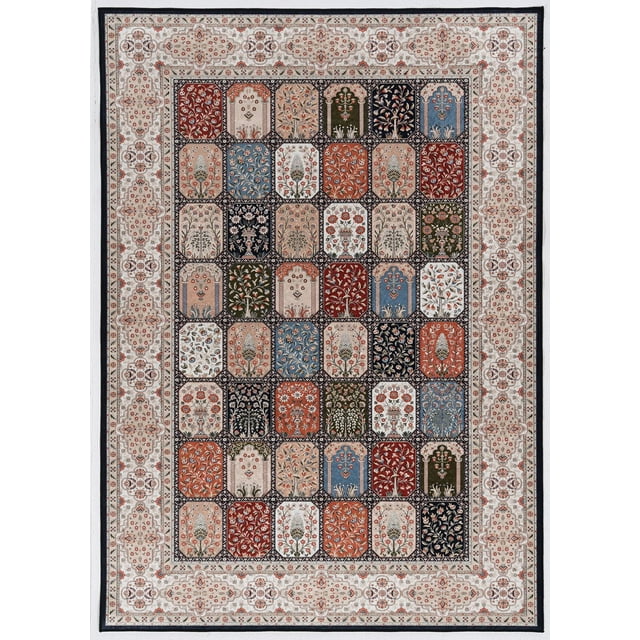 Emerald Paulson area rug measuring 6'7" x 9'7" with a patchwork pattern of floral and botanical designs in cream, blue, red, green and black tones.