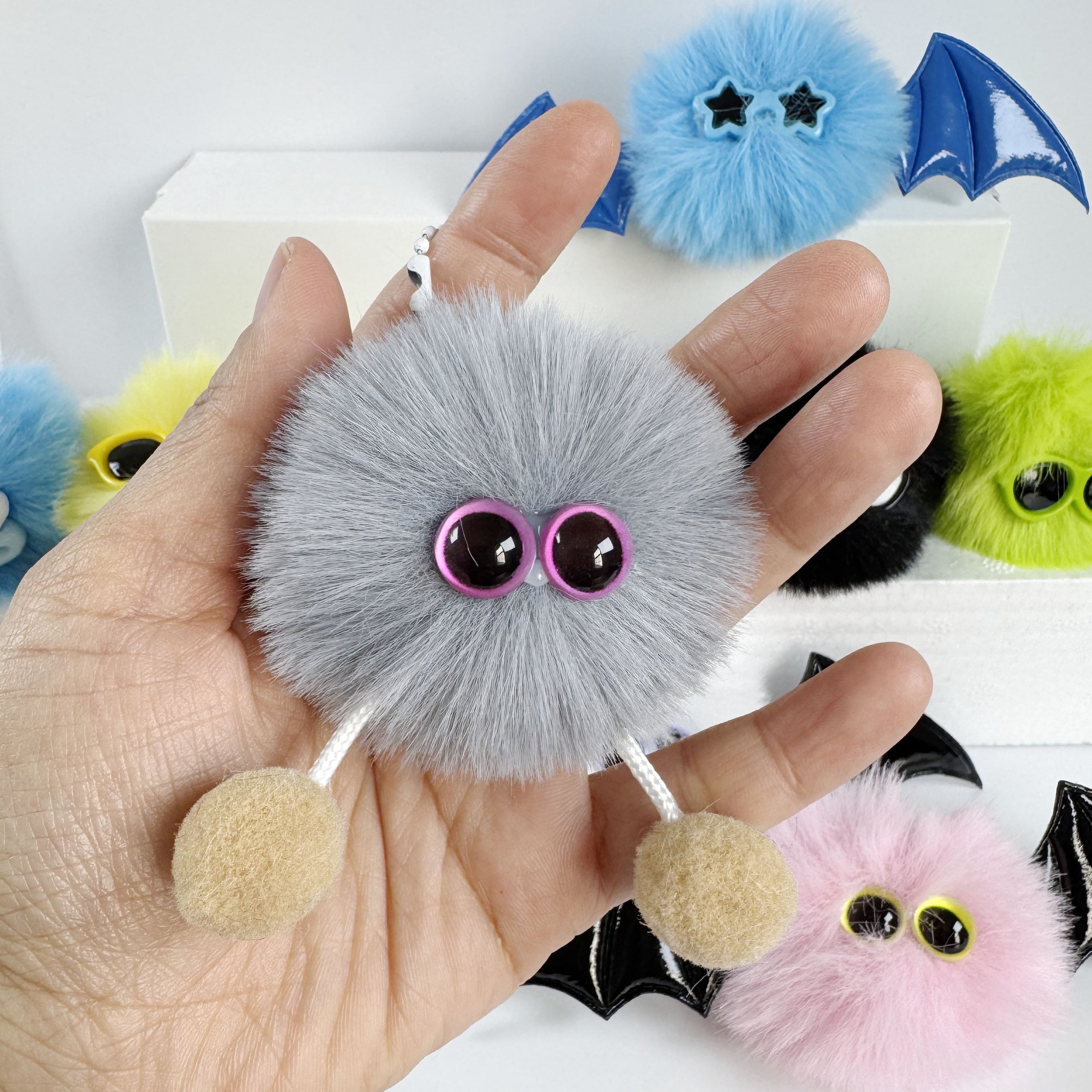 100pcs Faux Fur Pom Poms Balls with Elastic Loop, 2.4 Inch (6cm) Fluffy DIY Pompoms for Keychain, Hats, Shoes, Scarves and Bag Accessories, 10 Colors (10pcs Per Color)