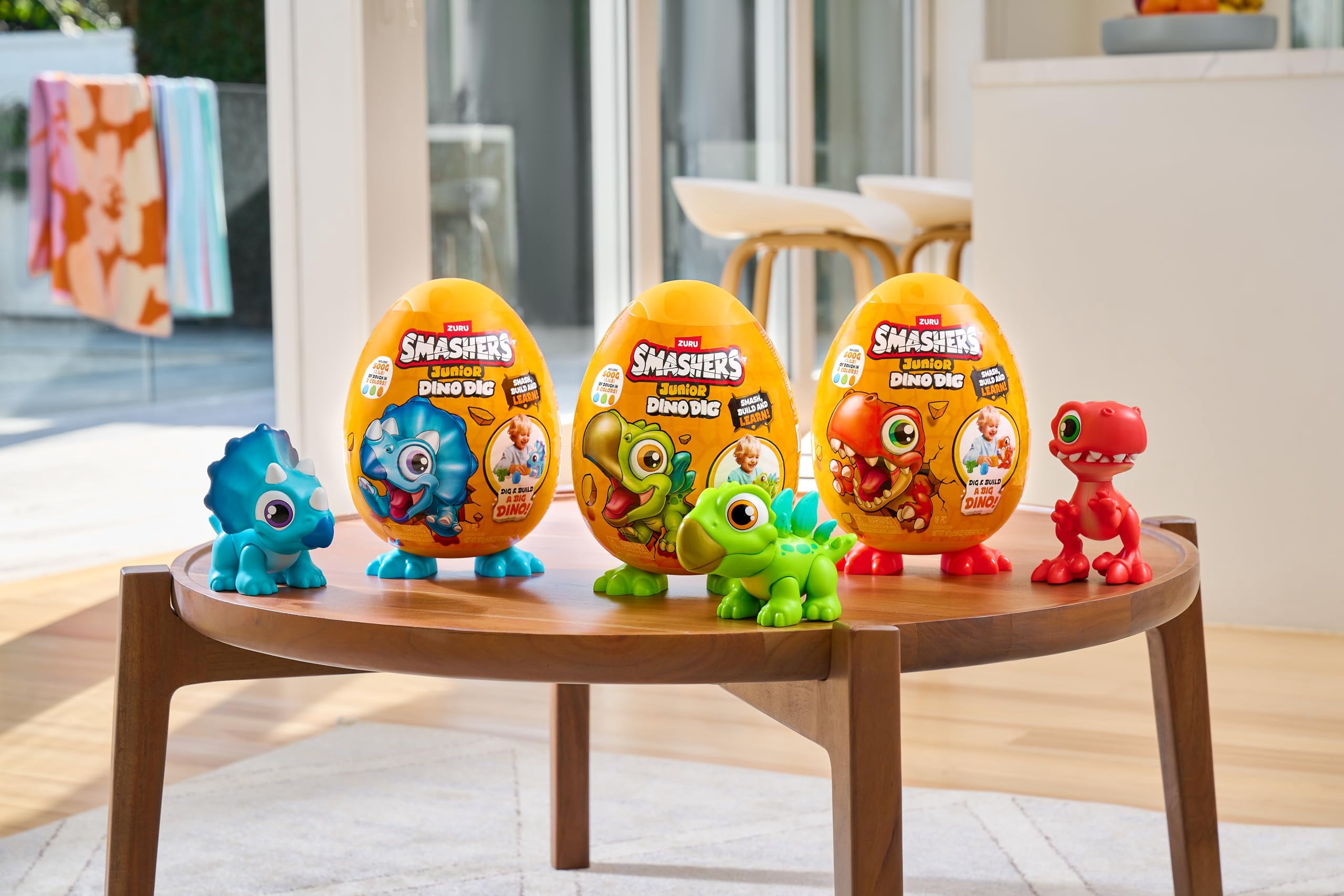 Huevo Sorpresa Smashers Junior Dino Dig Stegosaurus | 12 Sorpresas Con Masa Sensorial | Juguete Para 18 Meses A 3 Años