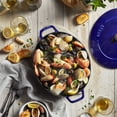 thumbnail image 2 of Staub Cast Iron 6.25-qt Shallow Oval Dutch Oven - Dark Blue, 2 of 8