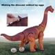 thumbnail image 5 of Juguete De Dinosaurios Eléctricos Para Niños Figura De Dinosaurios Que Caminan Con Lámpara De Proyector Y Simulación De Puesta De Huevos Modelo Tyrannosaurus Rex Para Niños Mayores De 3 Años Yuarrent HA037004-00, 5 of 6