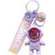 thumbnail image 1 of Llavero de astronauta YONGSHENG con luz de atardecer, 1 of 5