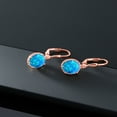 thumbnail image 4 of Gem Stone King 18K Rose Gold Plated Silver Blue Simulated Opal Leverback Dangle Earrings for Women (1.12 Cttw, Gemstone October Birthstone, Oval Cabochon 9X7MM), 4 of 5