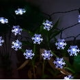 thumbnail image 4 of Solar Christmas Snowflake Lights, 39FT 100 LED 8 Modes Cool White Fairy String Lights  for Outdoor Garden Holiday Party Patio Yard Christmas Decorations, 4 of 7