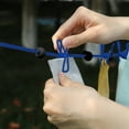 thumbnail image 4 of Fesfesfes Retractable Travel Clothesline with 12 Clips,Windproof Portable Drying Rack for Hotel, Camping, Compact Space Saving, Outdoor Camping Use Blue, 4 of 5