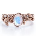 thumbnail image 1 of JeenMata Anillo de Novia con Diseño de Hojas Estilo Art Déco, Filigrana Milgrain, Piedra Lunar Azul de Corte Ovalado de 1,5 Quilates y Moissanita, Chapado en Oro Rosa de 18 K sobre Plata, 1 of 6