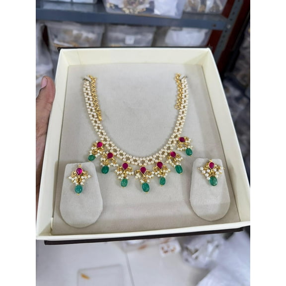 South Indian Bollywood Guttapusalu Hasli Necklace Set – Gold-Plated Matte Finish Brass with Ruby Kemp Stones, CZ, Green Beads & Matching Drop Earrings.