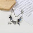 thumbnail image 3 of Pulsera exquisita con diseño de astronauta y la Tierra, regalo para damas, pulsera plateada con borlas, luna y estrellas (17 cm), 3 of 4