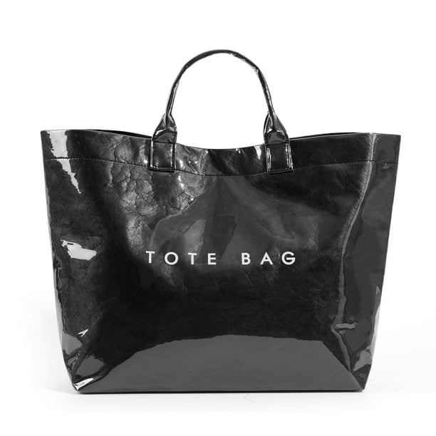 Bolsa de mano Lushandy de PVC para mujer, papel kraft con estampado de letras, transparente