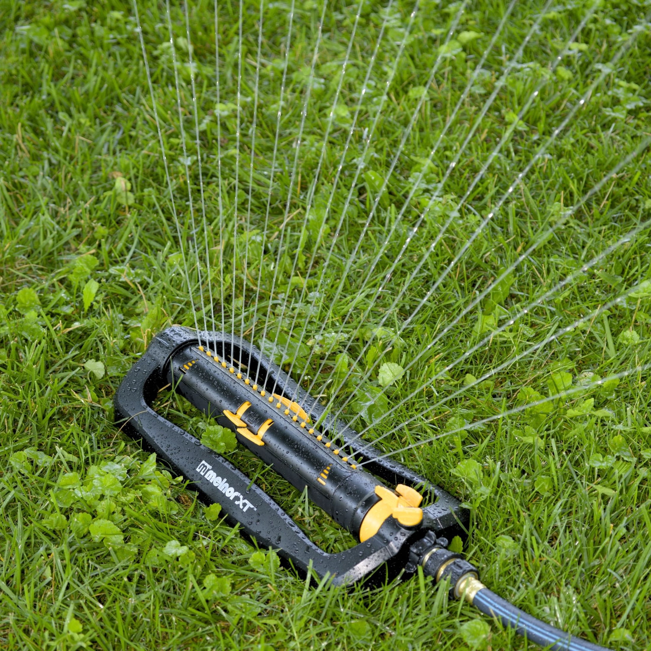 Melnor XT45200 Turbo Oscillating Sprinkler with Flow Control, 4,500 sq. ft., Adjustable Width and Range, Dirt-Resistant Drive - Black, Orange