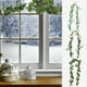 thumbnail image 1 of Guirnalda de hiedra artificial - enredadera de ratán sintético de 6 pies con hojas para decorar paredes, planta colgante de plástico verde para ventanas, bodas y decoración del hogar, 1 of 6