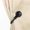 Black, variant on Central Design 4890-034 Remi Curtain Holdback Set, Antique Brass - Set of 2