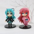thumbnail image 2 of Original nuevo 10 cm Hatsune Miku dibujos animados Kawaii cantante Virtual Manga estatua pelo verde negro gabardina cool PVC figura de acción, 2 of 4