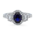 thumbnail image 2 of BERRICLE Sterling Silver 3-Stone Simulated Blue Sapphire Oval Cut Cubic Zirconia CZ Halo Fashion Ring for Women, Rhodium Plated 1.2 Carat Size 8, 2 of 10