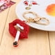 thumbnail image 1 of Llavero Jadeshay Metal Rojo Forma de Labio, 1 of 11