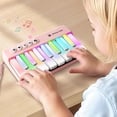 thumbnail image 1 of Minipiano de juguete iPlay iLearn Kids con luces de arcoíris, color rosa, 1 of 7