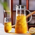 thumbnail image 5 of Annvchi 52oz Glass Pitcher, Glass Pitcher with Lid, Water Carafe with Handle for Hot/Cold Beverage Pitcher for Iced Tea and Juice Drink(with Stirring Spoon and Cleaning Brush Clear), 5 of 6