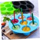thumbnail image 5 of Bandeja de silicona para panqueques de 4 piezas, 2 moldes para pasteles plegables de siete agujeros + 2 cepillos de aceite, placa para panqueques antiadherente, molde para pastel de freidora de aire, 5 of 6