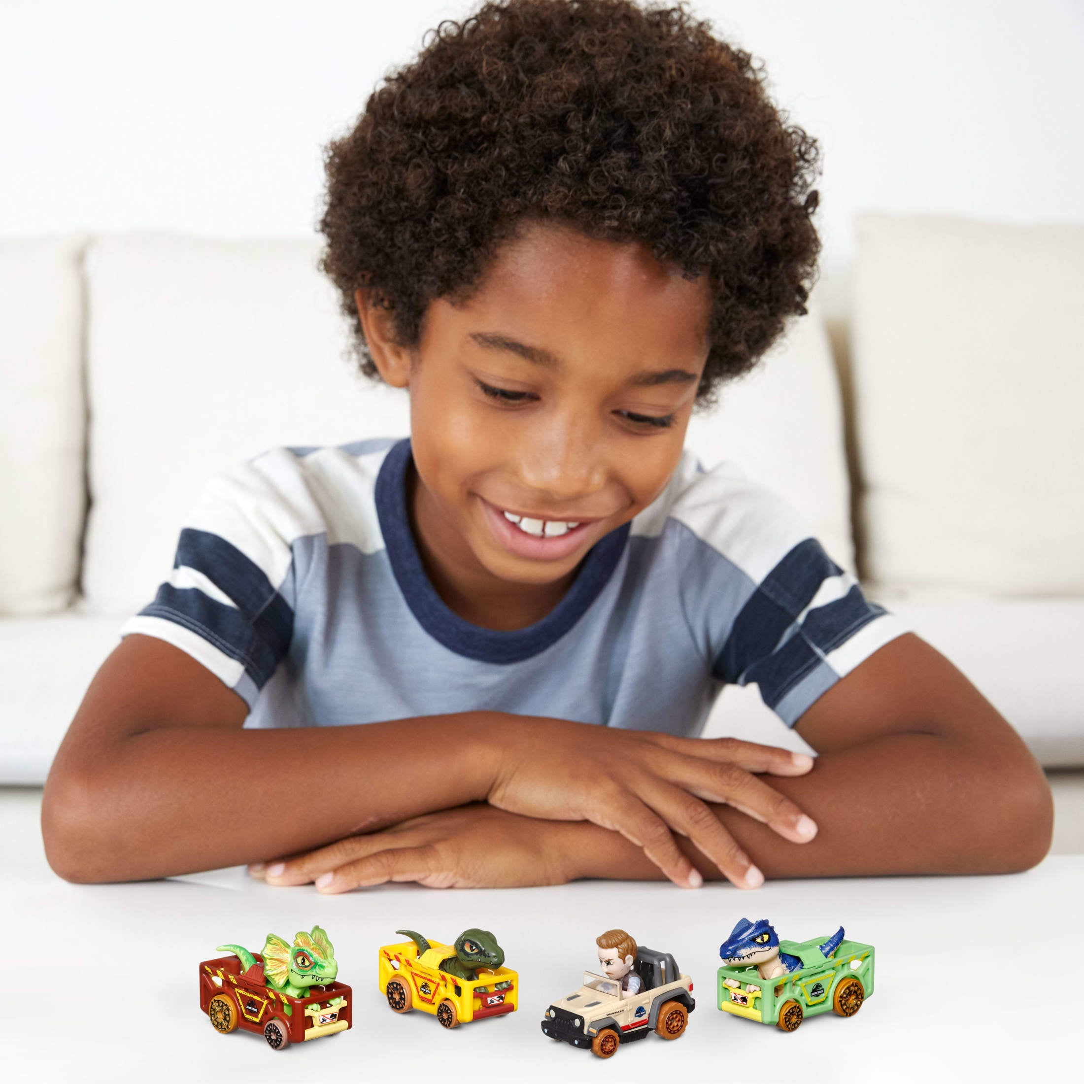Hot Wheels RacerVerse, Set of 4 Car & Truck Play Vehicles with Jurassic World Characters as Drivers