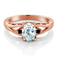 thumbnail image 2 of Gem Stone King 18K Rose Gold Plated Silver Sky Blue Aquamarine and Black Diamond 3 Stone Engagement Ring for Women | 1.27 Cttw | Oval 8X6MM | Round 2MM | Gemstone March Birthstone | Size 6, 2 of 4