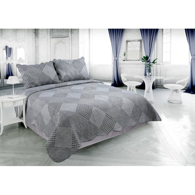Grey quilted coverlet bedspread set with stitched modern grid and stripes plaid pattern, including matching pillow shams, displayed on a styled bed in a bright contemporary bedroom.