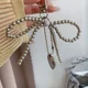 thumbnail image 3 of Llavero de corazón de lazo blanco plateado para mujer, llavero de mochila con lazo de perla, joyería hecha a mano, adorno de bolsos, colgantes Gif, 3 of 5
