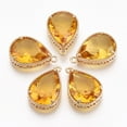 thumbnail image 2 of 2 colgantes de cristal facetado en forma de lágrima con engaste de latón dorado y parte trasera abierta., 2 of 2