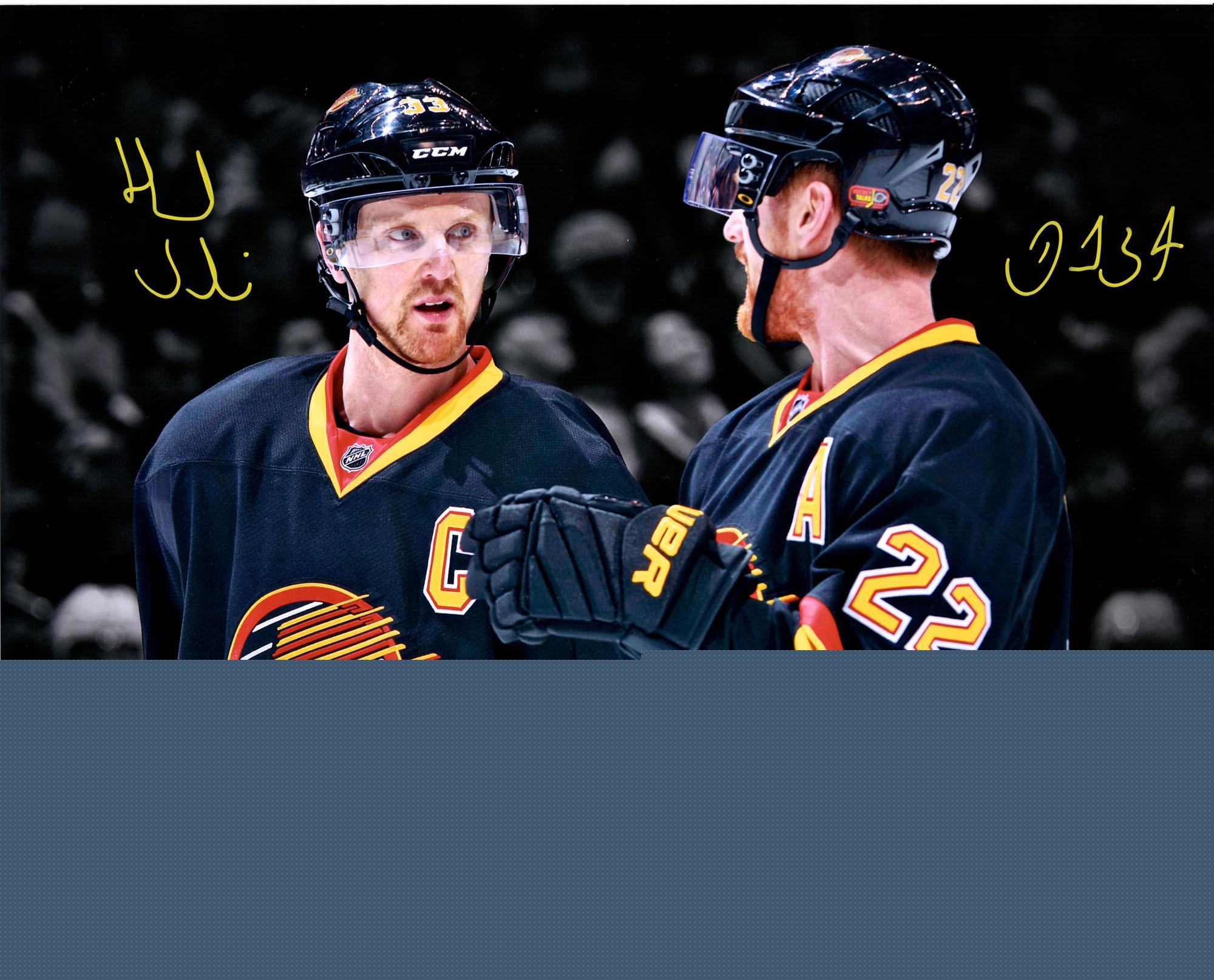 Daniel Sedin and Henrik Sedin Vancouver Canucks Autographed 16" x 20" Throwback Jersey Spotlight Photograph - Fanatics Authentic Certified