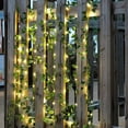 thumbnail image 5 of SATRINO Solar Vine String Lights, 16.4ft 100 LED Solar String Lights, Artificial Ivy Leaf Solar Plant Vine Lights, Outdoor Ivy Fairy Lights for Outside Wedding Garden Fence Wall Hanging Decor, 5 of 8