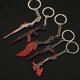 thumbnail image 4 of Juego de llaveros de la serie Valorant Gaias Vengeance, modelo de metal periférico de juego Vandal, accesorios colgantes, llaveros, regalos, juguetes para niños, 4 of 5