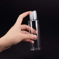 thumbnail image 4 of Paquete de 8 botellas de plástico PET transparentes rellenables de 200 ml (6.7 oz) para viajes, con tapa abatible a presión., 4 of 9