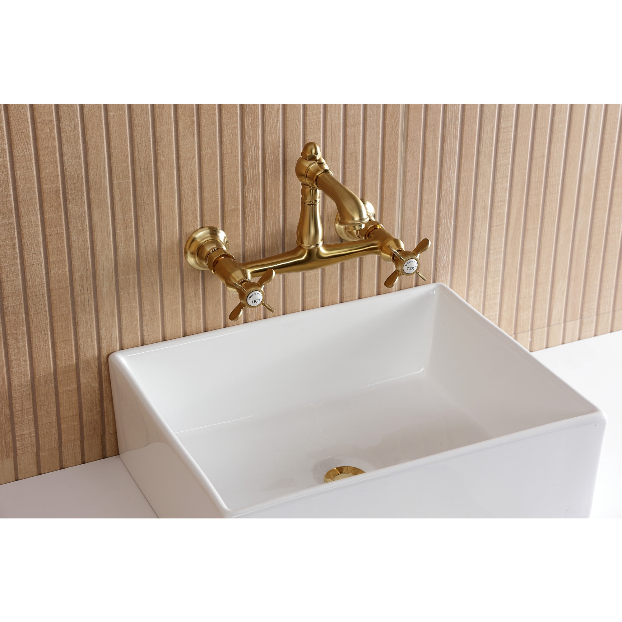Kingston Brass KS7257BEX Essex Double-Handle 2-Hole Wall Mount Bathroom Faucet in Brushed Brass