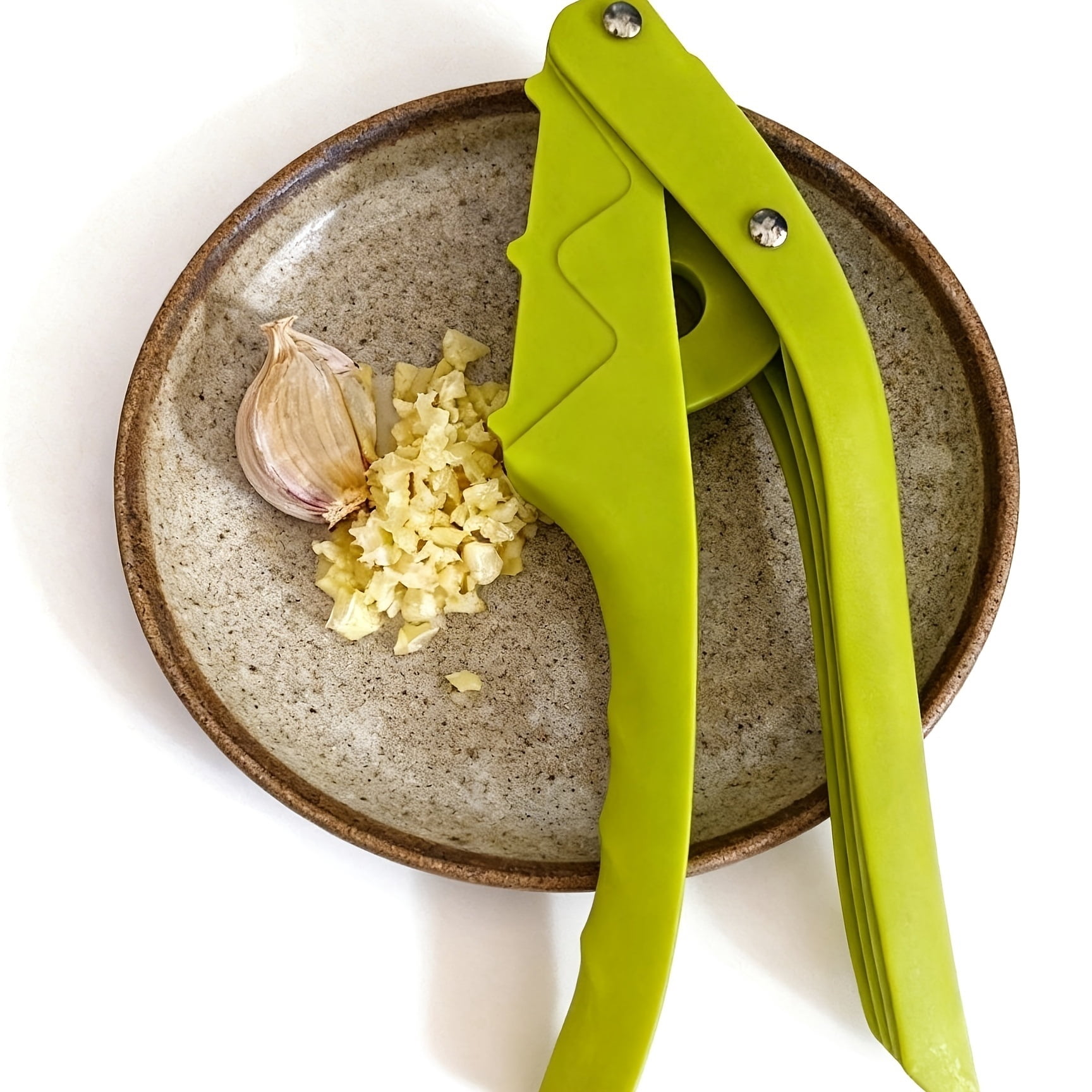 Stainless steel two-in-one garlic press is a must-have garlic slicing tool in the kitchen. It is durable and easy to clean. It is suitable for families and professional chefs.