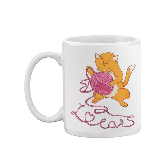 Cat Playing With A Yarn Mug -Image by Shutterstock,