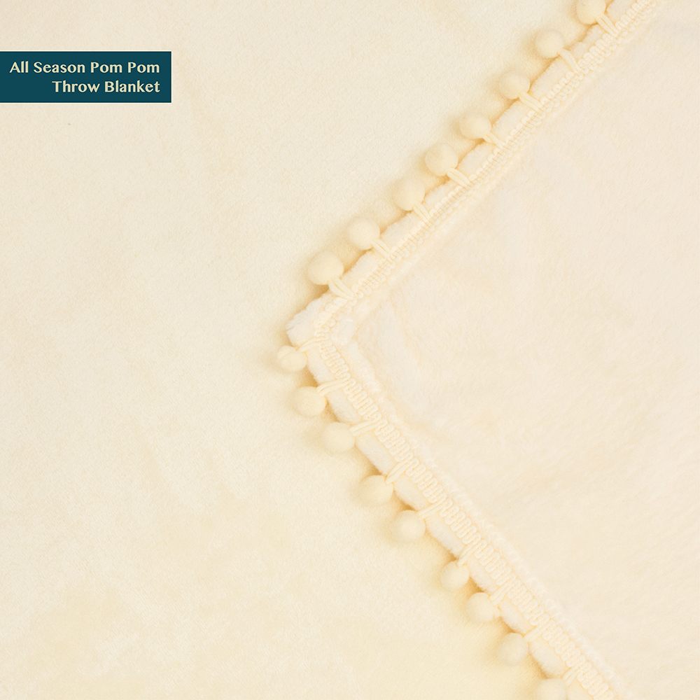 PAVILIA Fleece Throw Blanket for Couch with Pom Pom Fringe, Cream Beige, Soft Cozy Fuzzy Flannel Blanket for Sofa Bed, Lightweight Plush All Season Throw, 50x60 Inches