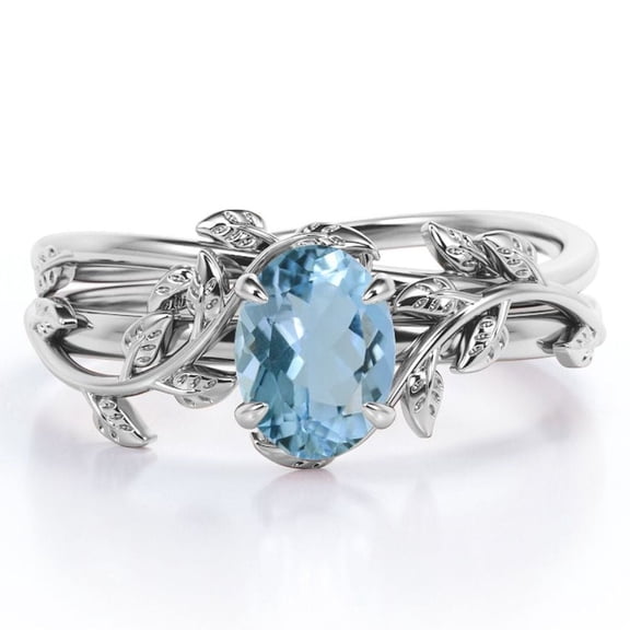 JeenMata Four Prong Set 1.3 Carat Oval Shaped Light Blue Created Aquamarine Vine Leaf Design Wedding Set in 18K White Gold Plating over Silver