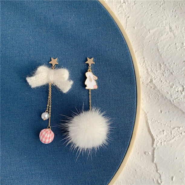 Clip on sale pom pom earrings