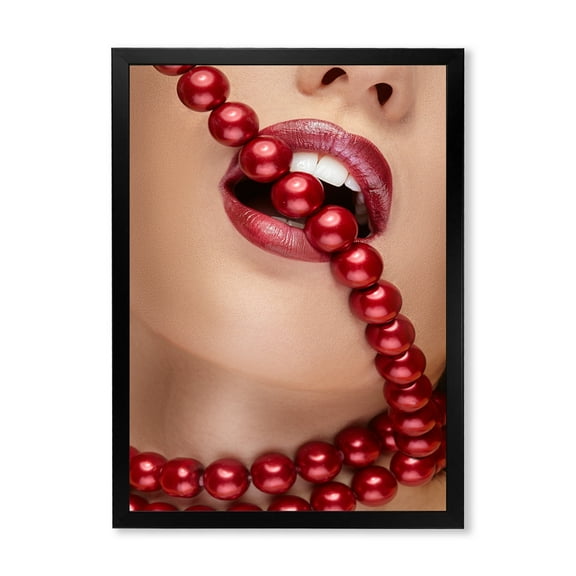 Designart 'Girl Mouth With Red Lipstick Biting Red Pearls' Modern Framed Art Print