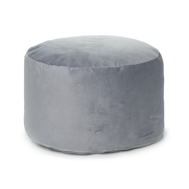 Gouchee Home Belgique grey velvet round pouf filled with polystyrene beads, measuring 20 by 12 inches.