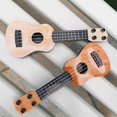 thumbnail image 3 of HSHDLDF Kids Ukulele, Guitar Toys for Toddler Children Kids Musical Instruments Plastic Ukulele Model Toy Instruments Educational Toy Music Learning Toys for Kids Ages 3- 5, Beige, 3 of 7