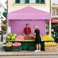 thumbnail image 4 of Costway 6.5 x 6.5 FT Pop up Canopy Tent with 4 Sidewalls, Wheeled Bag, 4 Sandbags, 8 Stakes Pink, 4 of 10