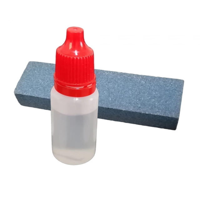 Whetstone Sets Wet Stones Sharpening Kits Knife Maintenance Set Grinding Stone. The image displays a blue rectangular sharpening stone and a bottle of knife-protecting oil with a red cap. This compact kit, measuring 74mmx20mmx11mm, is designed for knife care, preventing rust and maintaining sharpness, suitable for home or professional use.